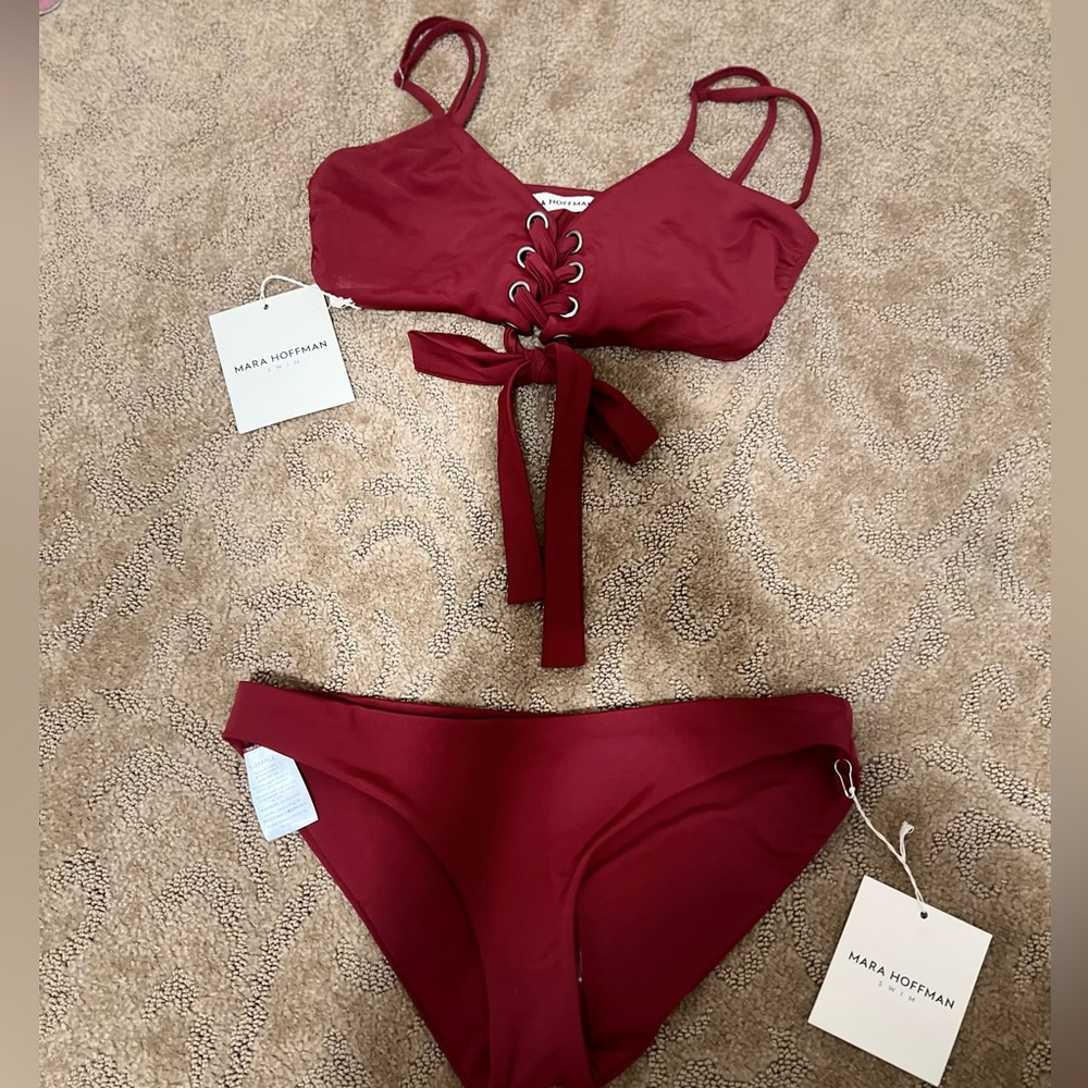 This is a red two piece size XS Mara Hoffman swim suit